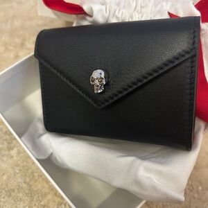 Brand new Alexander McQueen playing card set single in leather pouch with skull